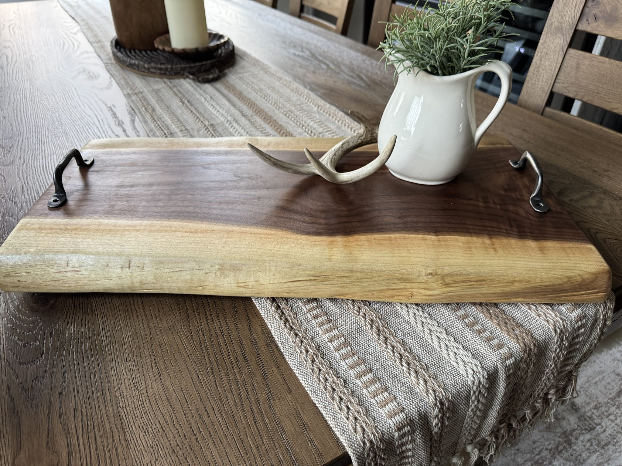 Walnut charcuterie board with forged handles