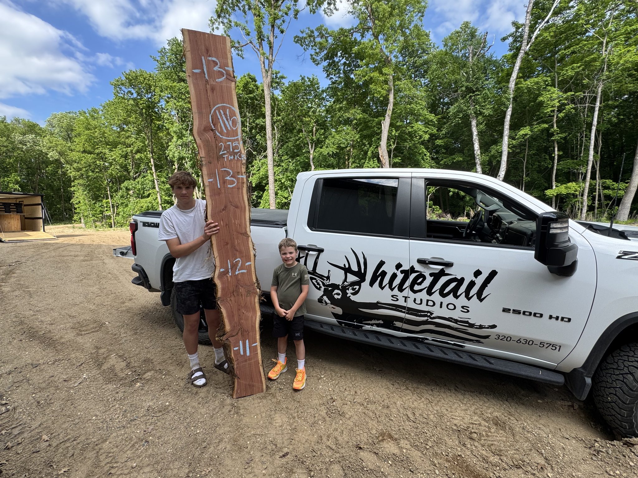Live edge slab beside the Whitetail Studios truck