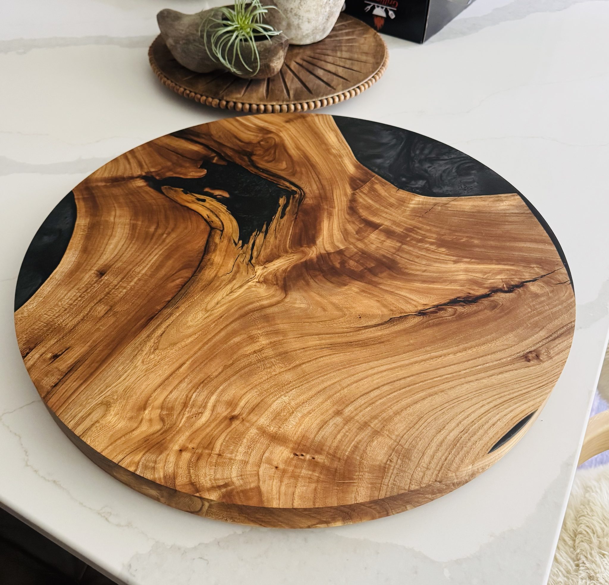 Round epoxy river table top