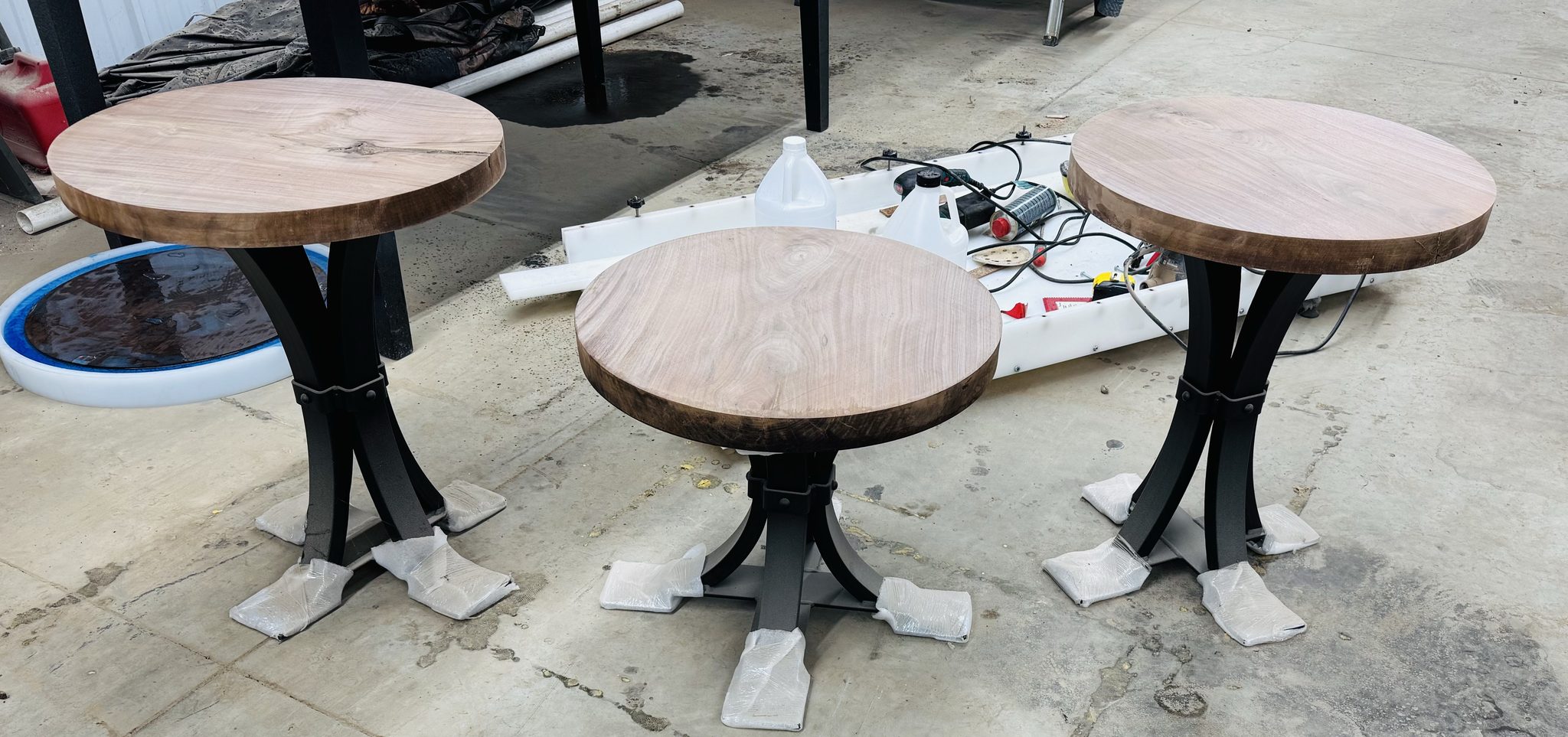 Round live edge tables in the workshop