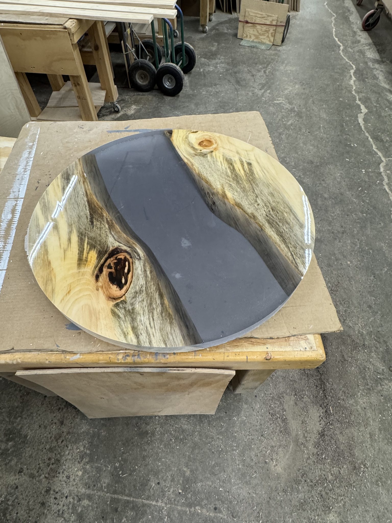 Round epoxy table with grey resin